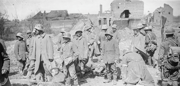 German prisoners acting as stretcher bearers for British and German wounded soldiers, 9 April 1917. © IWM Q 5125