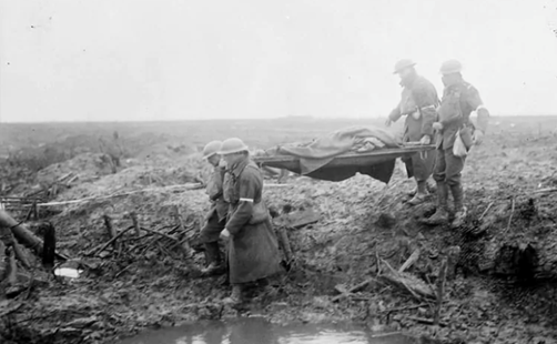 Stretcher bearers carry wounded to the aid-post, Third Ypres, November 1917