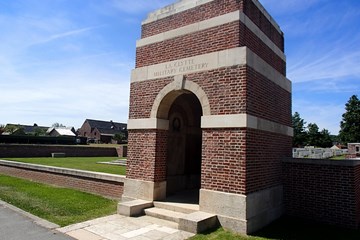 A unique headstone detailing two men, but only one of which is buried here