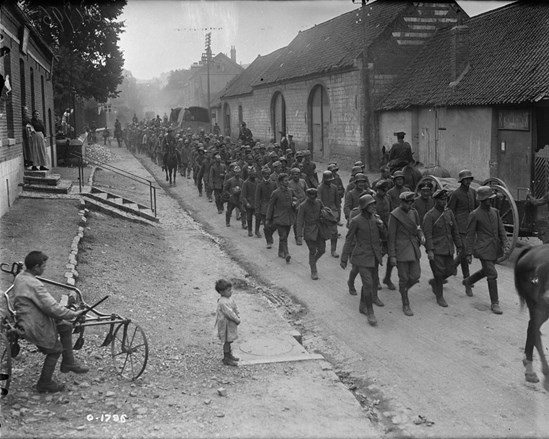 German Prisoners Being Marched Through A Village.