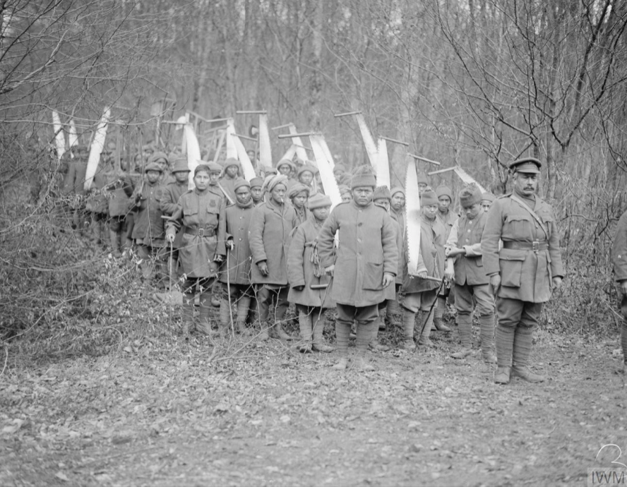 Men of the Indian Labour Corps logging in the Foret de Lyons, 23 January 1918. © IWM (Q 8497)