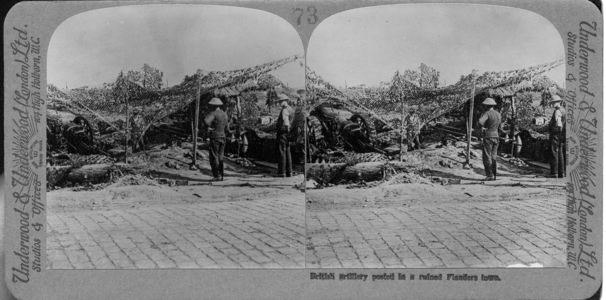 British artillery posted in a ruined Flanders town