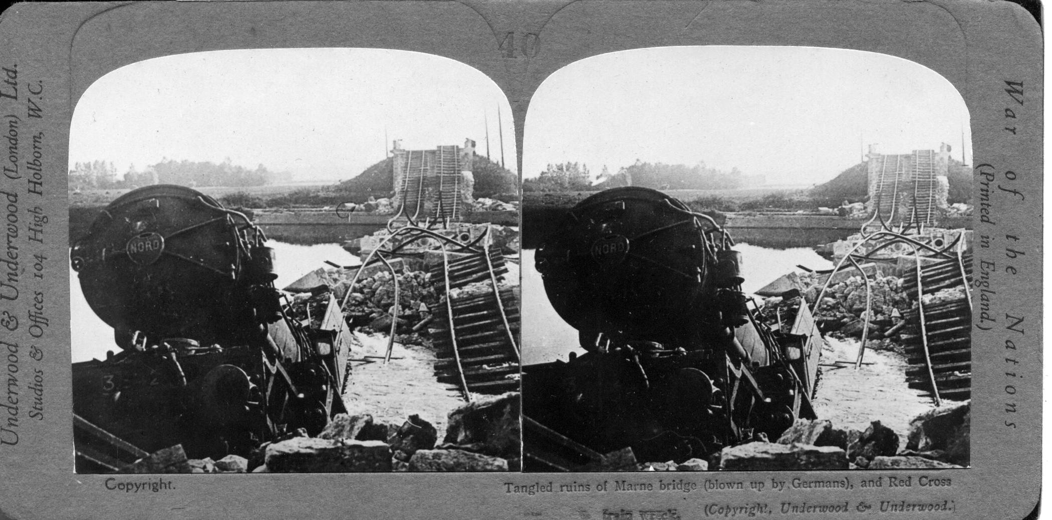 Tangled ruins of Marne bridge (blown up by Germans), and Red Cross train wreck