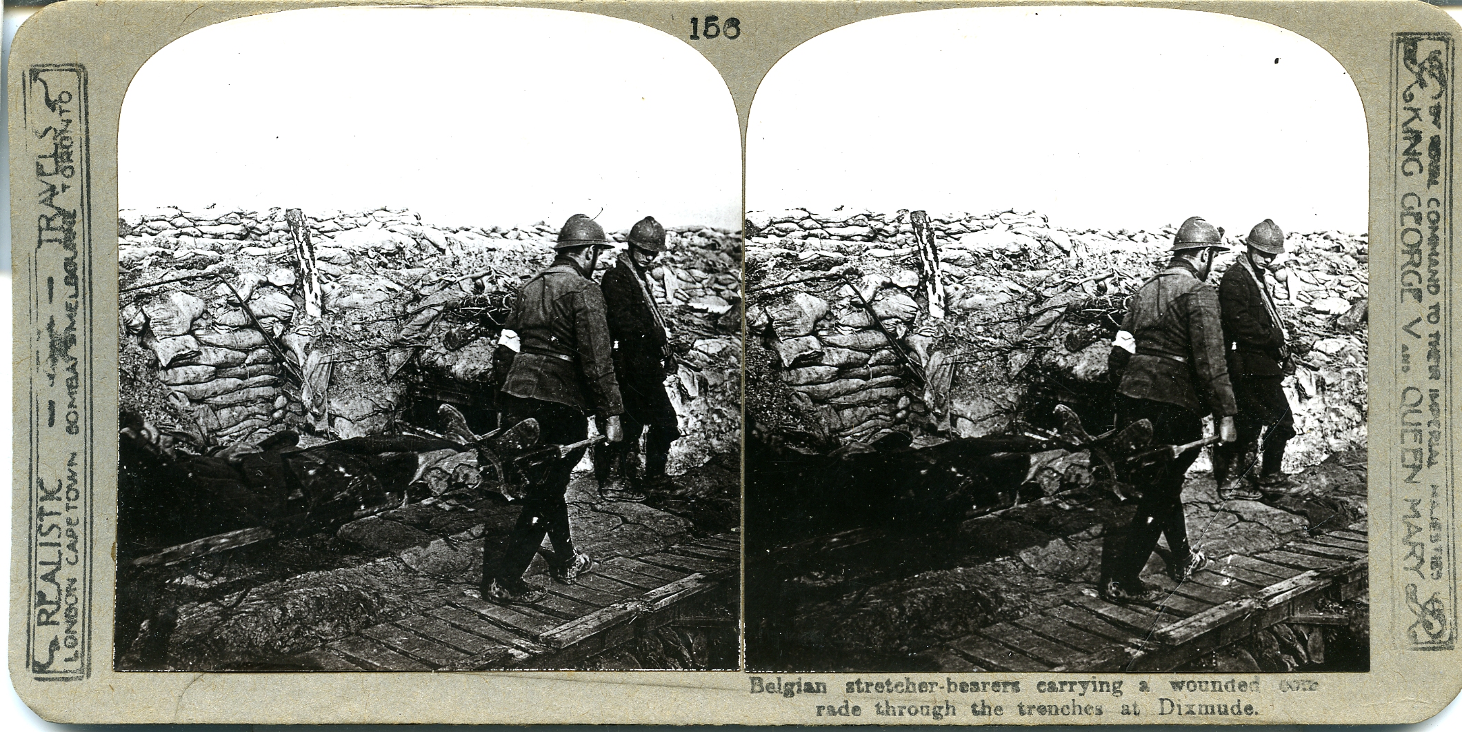 Belgian stretcher bearers carrying a wounded comrade through the trenches at Dixmude