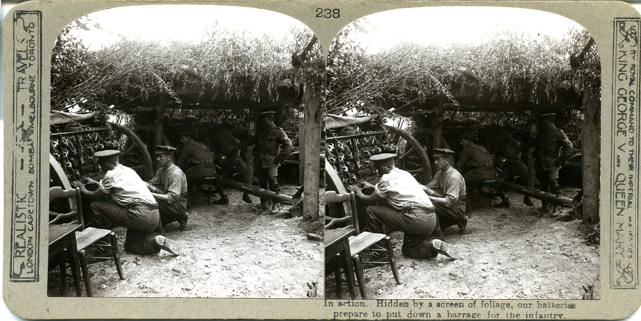 In action. Hidden by a screen of foliage, our batteries prepare to put down a barrage for the infantry