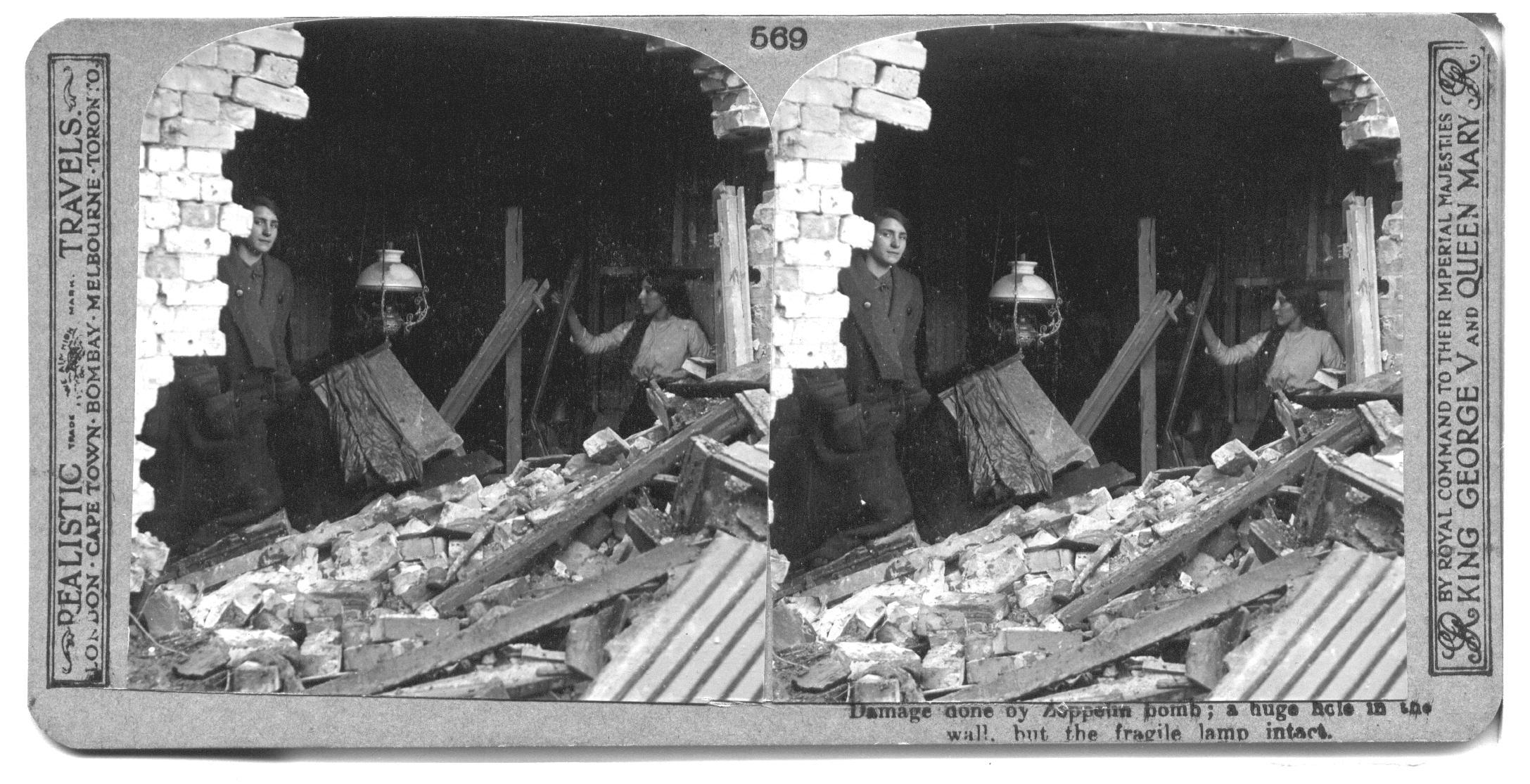 Damage done by Zeppelin bomb; a huge hole in the wall, but the fragile lamp intact