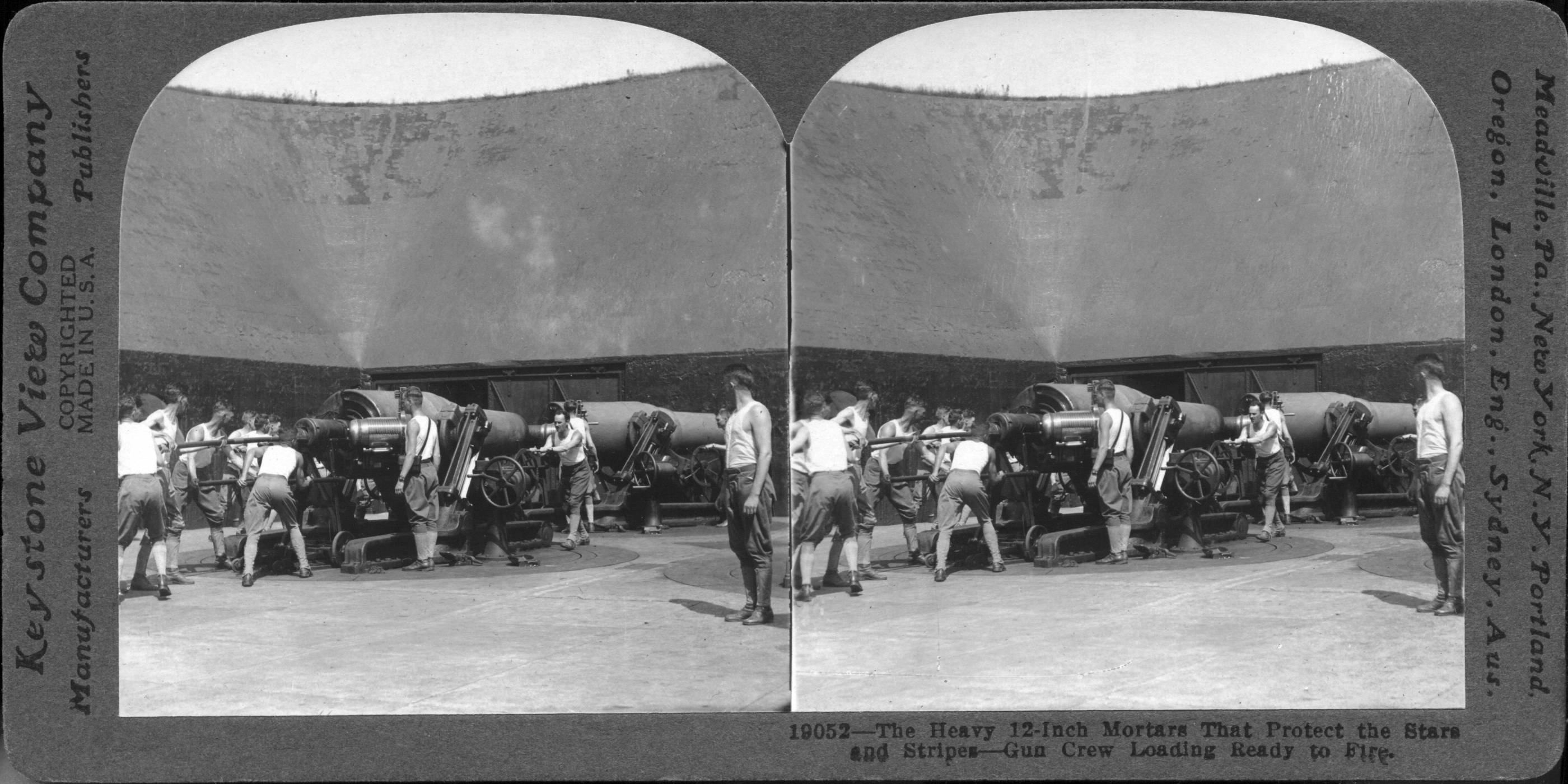 The Heavy 12-Inch Mortars That Protect the Stars and Stripes--Gun Crew Loading Ready to Fire