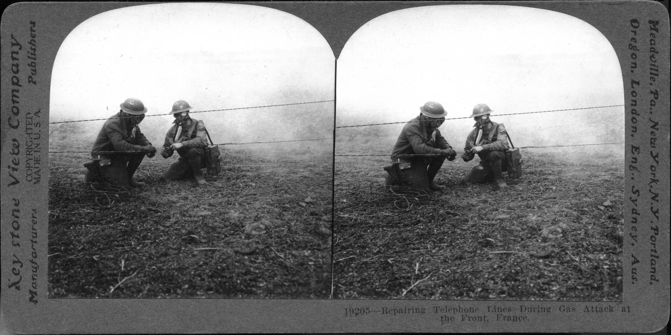 Repairing Telephone Lines During Gas Attack at the Front, France
