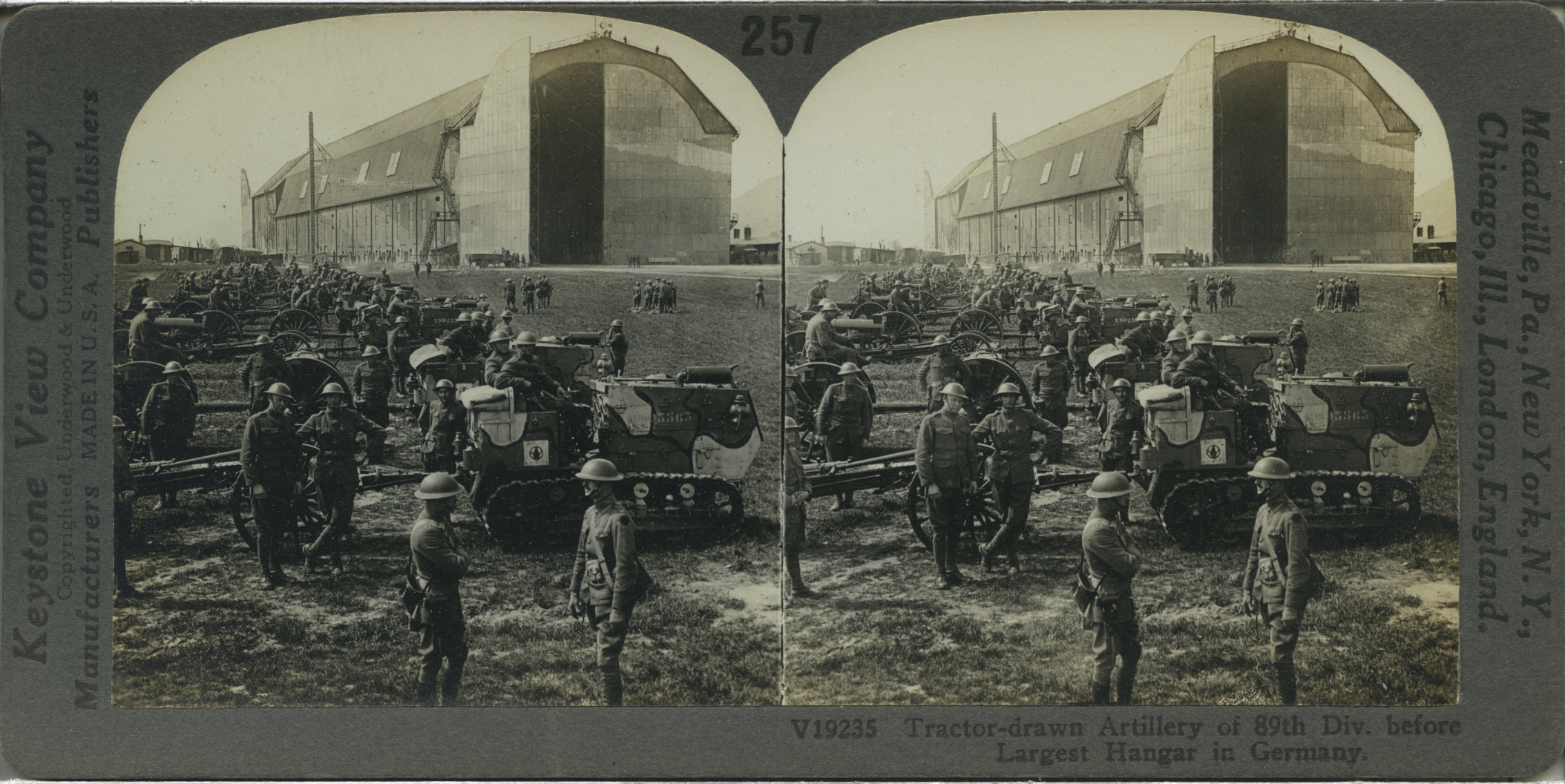 Tractor-drawn Artillery of 89th Div. Before Largest Hangar in Germany