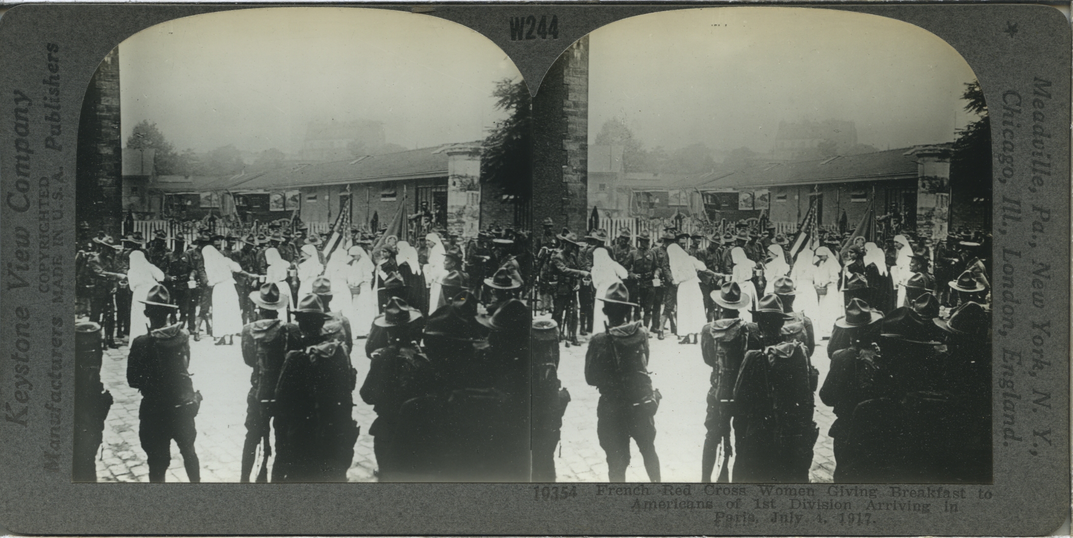 French Red Cross Women Giving Breakfast to Americans of 1st Division Arriving in Paris, July 1, 1917