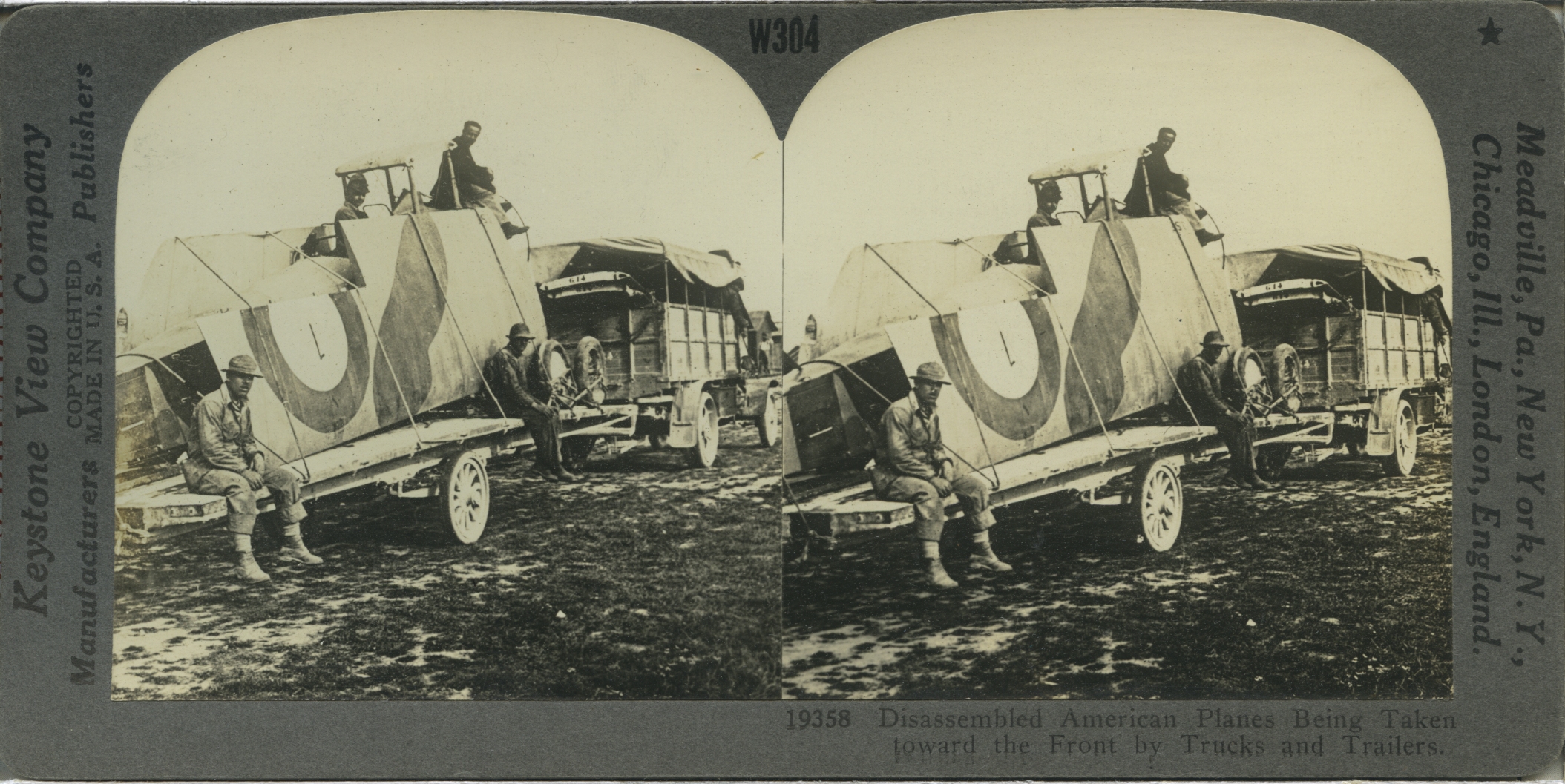 Disassembled American Planes Being Taken toward the Front by Trucks and Trailers