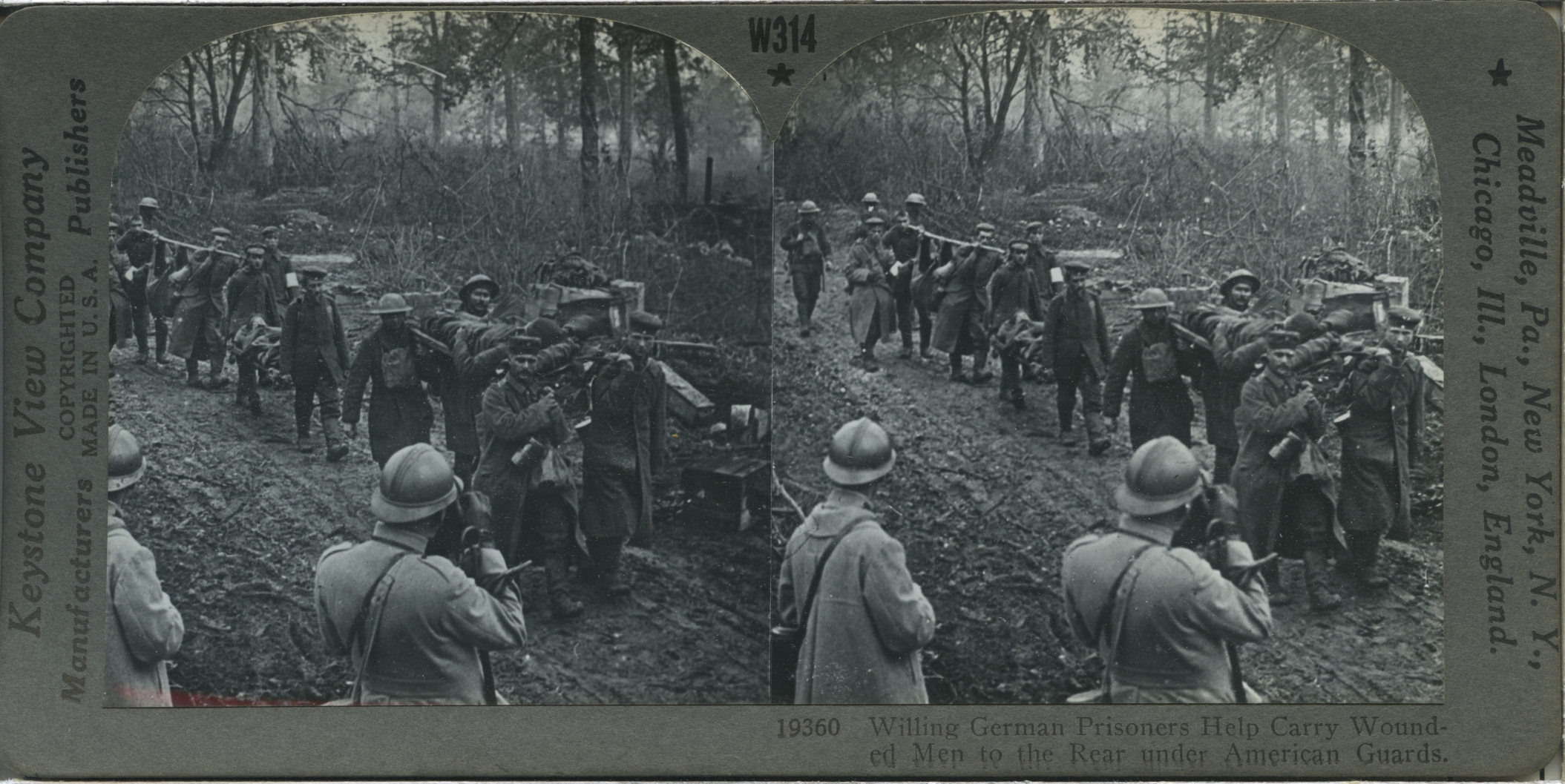 Willing German Prisoners Helping to Carry Wounded men to the Rear under American Guards