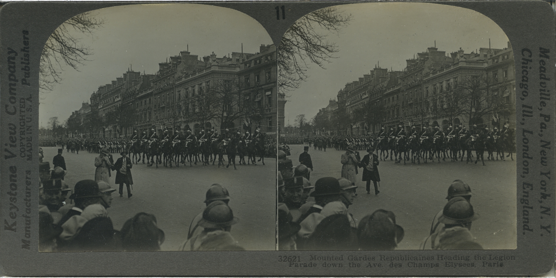 Mounted Gardes Republicaines Heading the Legion Parade down Ave. des Champs Elysees, Paris.