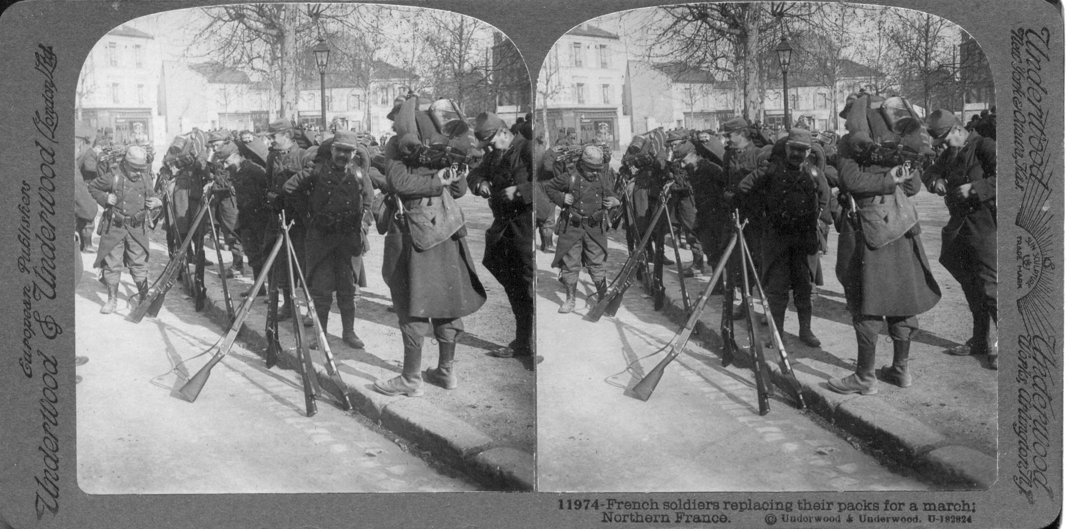 French soldiers replacing their packs for a march, Northern France