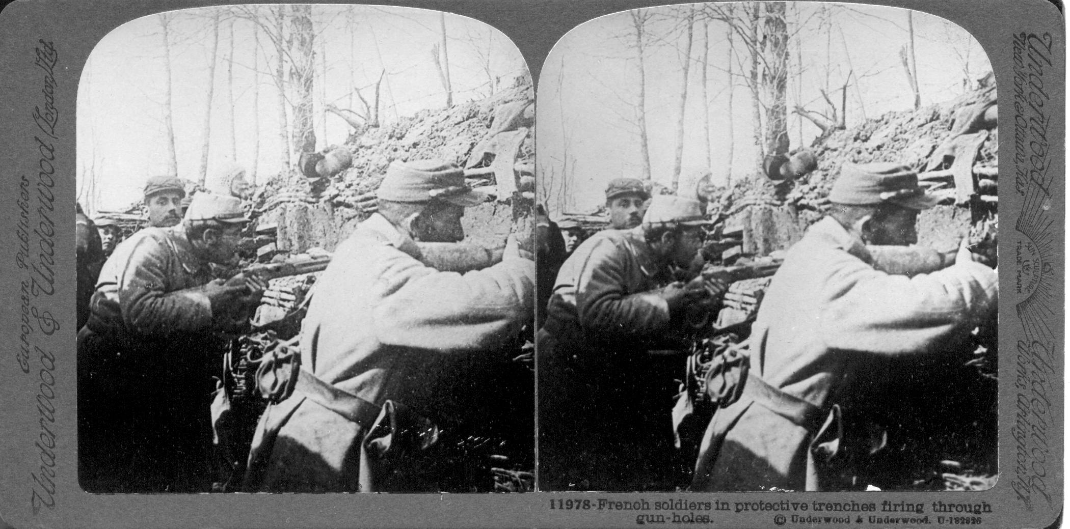 French soldiers in protective trenches firing through gun-holes