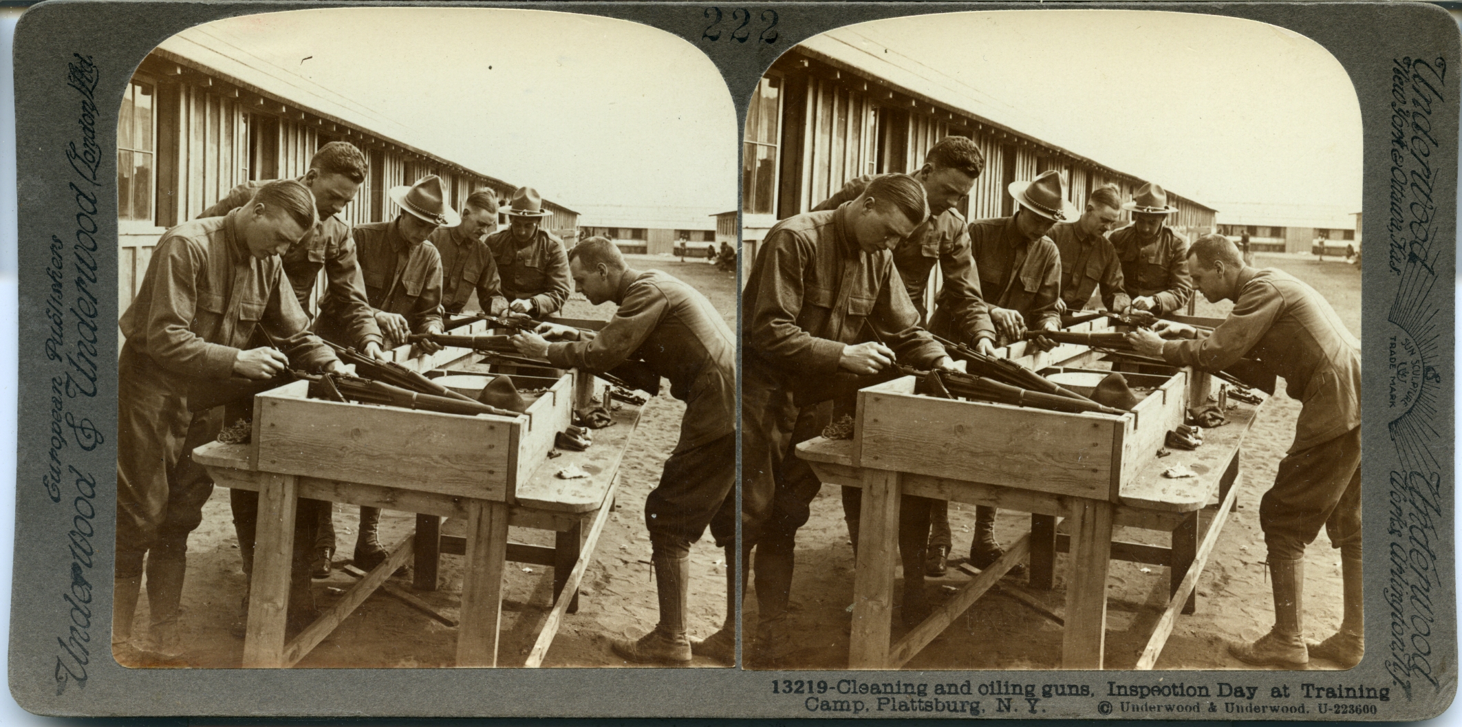 Cleaning and oiling guns. Inspection Day at Training Camp, Plattsburg, N.Y.