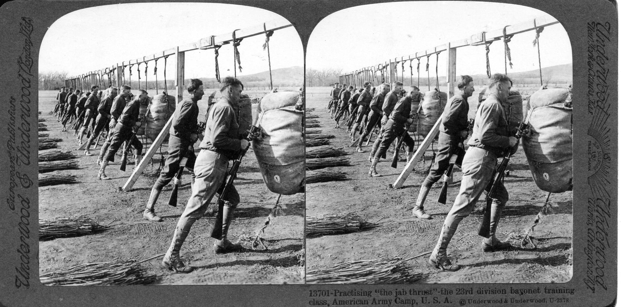 Practising "the jab thrust"-the 23rd division bayonet training class, American Army Camp, U.S.A.