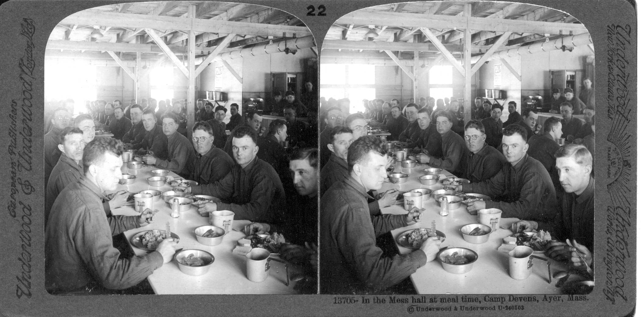 In the mess hall at meal time, Camp Devens, Ayer, Mass.