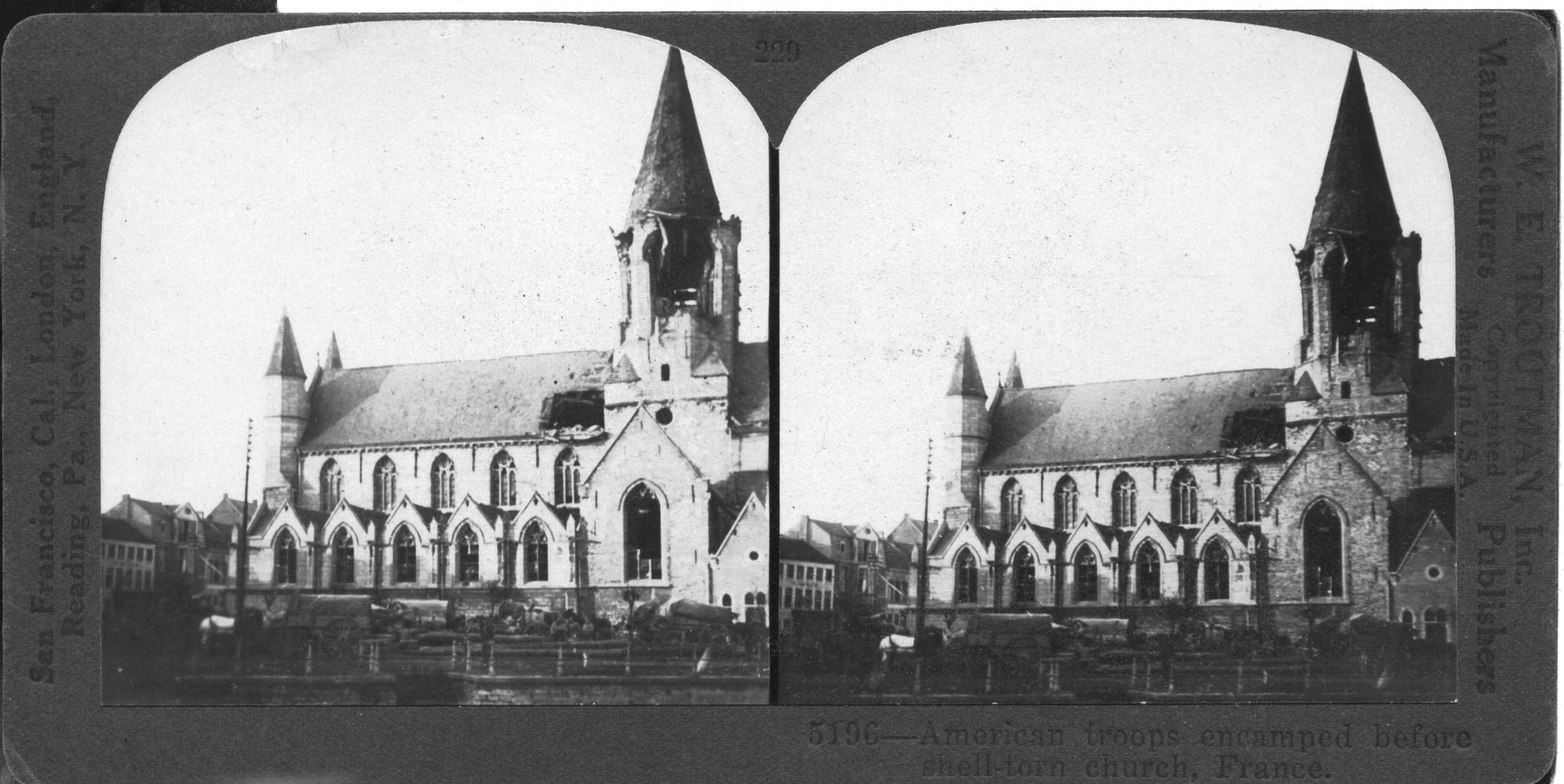 American troops encamped before shell-torn church, France