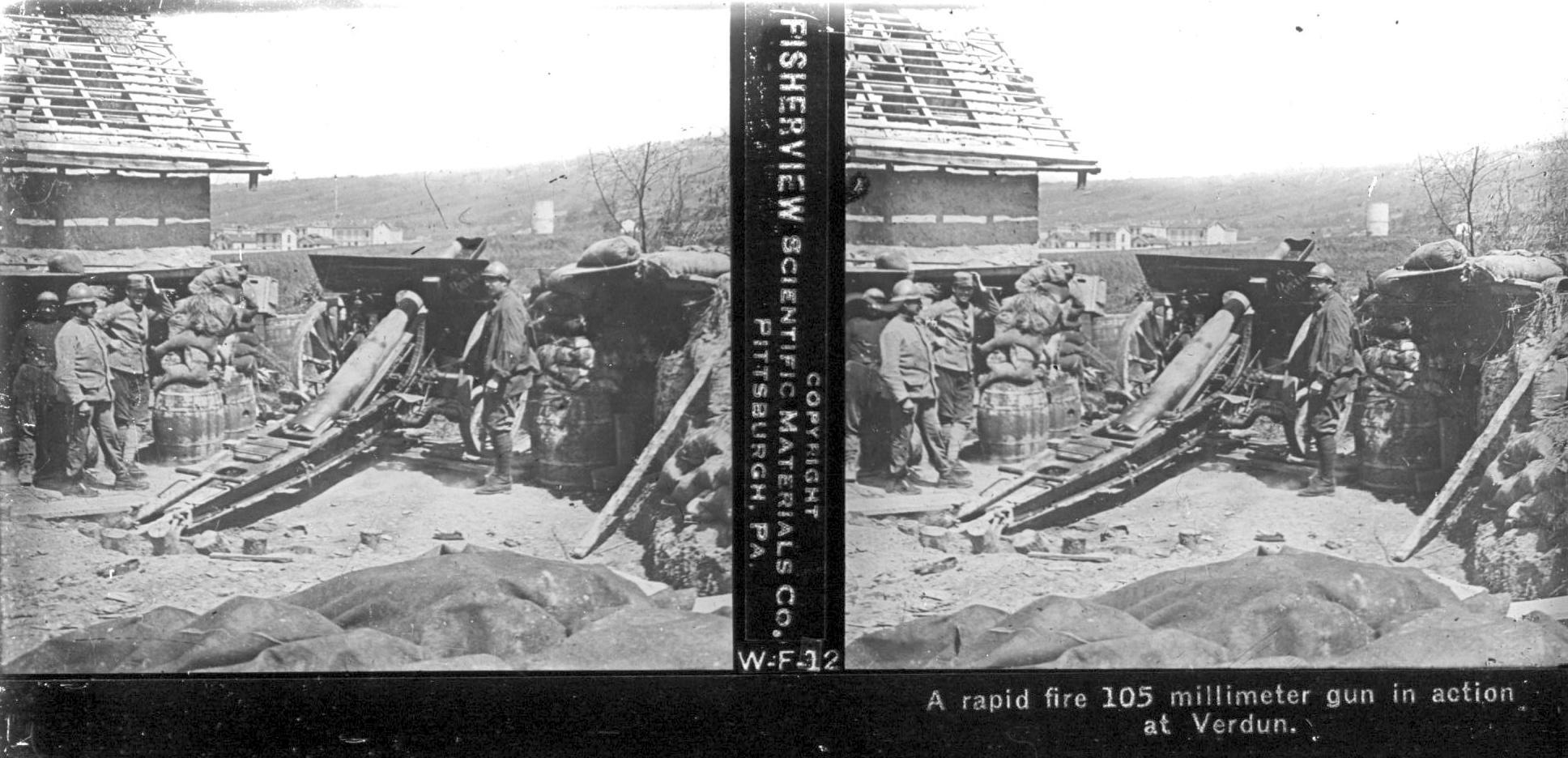 A rapid fire 105 millimeter gun in action at Verdun
