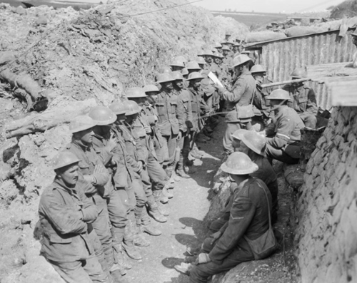 Battle of Albert. Roll call of the 1st Battalion, Lancashire Fusiliers, on the afternoon of 1 July 1916, following their assault on Beaumont Hamel during the opening day of the Battle of the Somme. © IWM Q 734