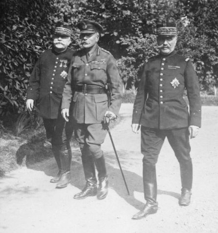 General Joseph Joffre, the C-in-C of the French Army; General Ferdinand Foch, the Commander of the French Army on the Somme; and General Douglas Haig, the C-in-C of the British Army, walking in the gardens at Beauquesne, 12th August 1916. © IWM Q 992