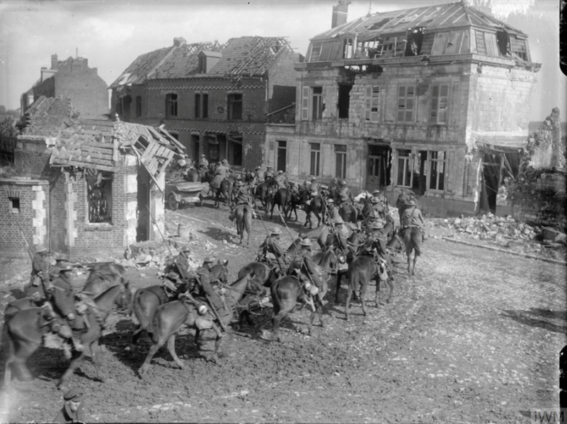 Battle of Vimy Ridge. British cavalry riding through Arras, 11 April 1917. © IWM (Q 2825)© IWM (Q 2825)