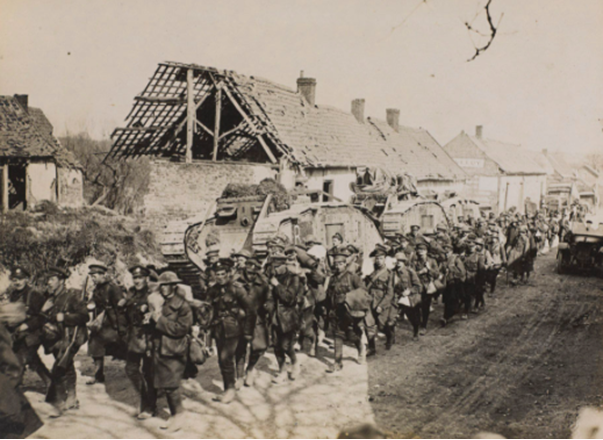 'The German offensive. Troops passing Tanks on a road in France', 1918 [NAM image number: 134513]
