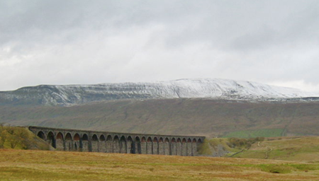 A snow-covered Whernside and Ribblehead Viaduct seen from Ribblehead Cyberdemon007 CC BY SA 3.0
