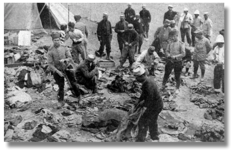 French soldiers at Sedd-el-Bahr, Cape Helles, during the Battle of Gallipoli, 1915. Photo from The War Illustrated, 19 June 1915. Caption reads: :French soldiers sorting out the kits of fallen in their camp at Seddul Bahr, the Turkish fort on the Gallipoli shores that was captured by the allied troops. These photographs were taken by the official photographer with the Dardanelles Expedition.