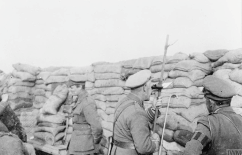 The Commanding Officer of the 12th Battalion, Manchester Regiment visiting 37 trench, Hill 60, near Ypres in August 1915. © IWM Q 60486