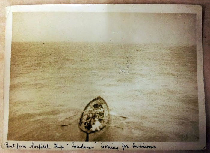 Boat from the hospital ship Soudan looking for survivors.