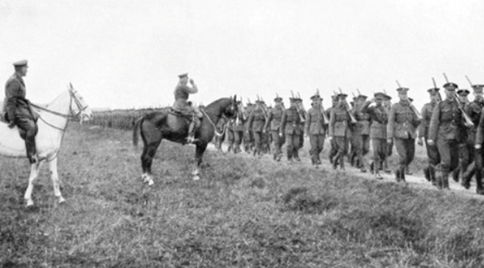 The Grenadier Guards marching in fours past their Colonel Field-Marshal HRH The Due of Connaught, K.G. 1 November, 1916 as featured in The Grenadier Guards in the Great War of 1914 - 1918, Vol. II, by Frederick Ponsonby