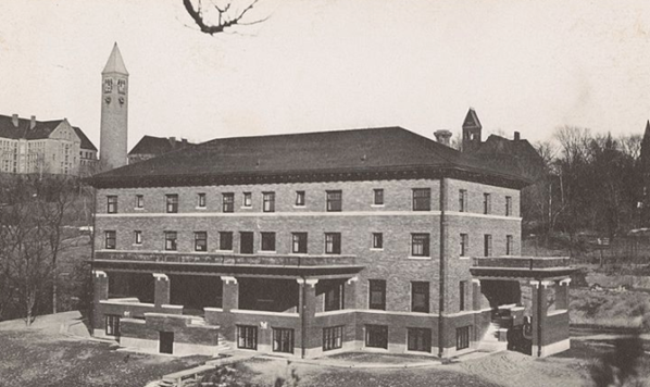 The Telluride House at Cornell University in 1910, the year it was built. In the background are the McGraw Tower and Uris Library