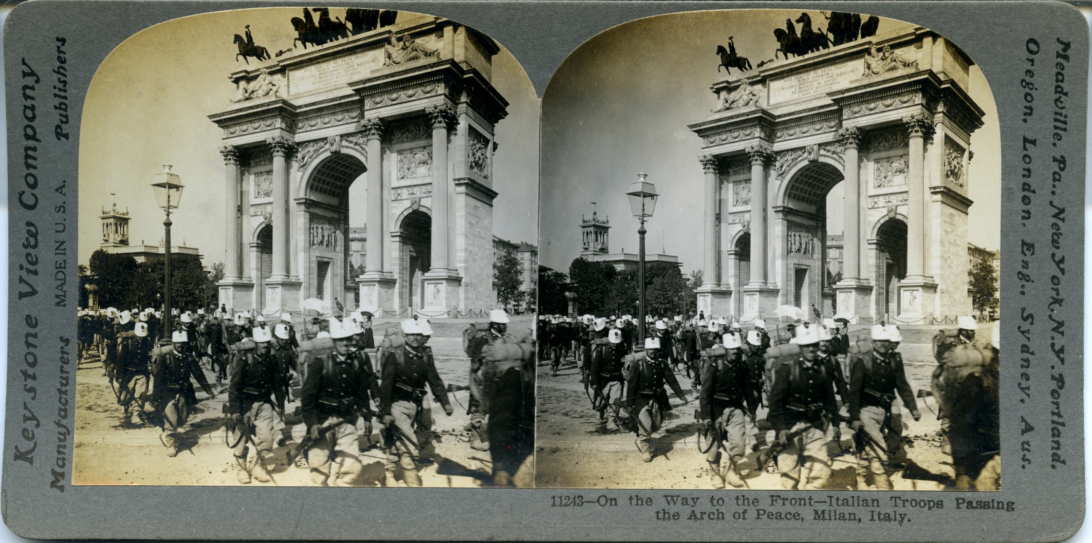 On the way to the front, Italian troops passing the Arch of Peace, Milan
