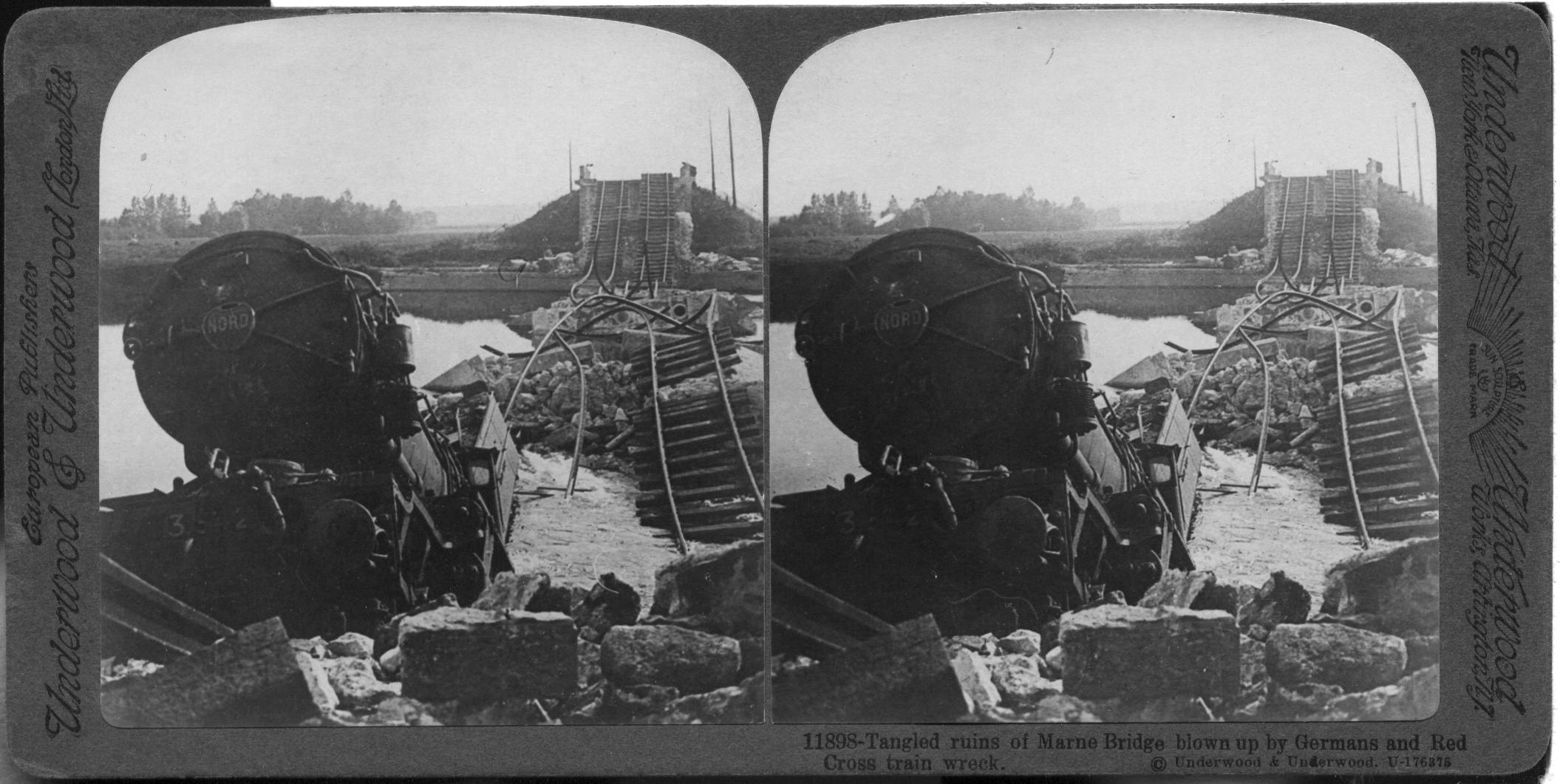 Tangled ruins of Marne Bridge blown up by Germans and Red Cross train wreck