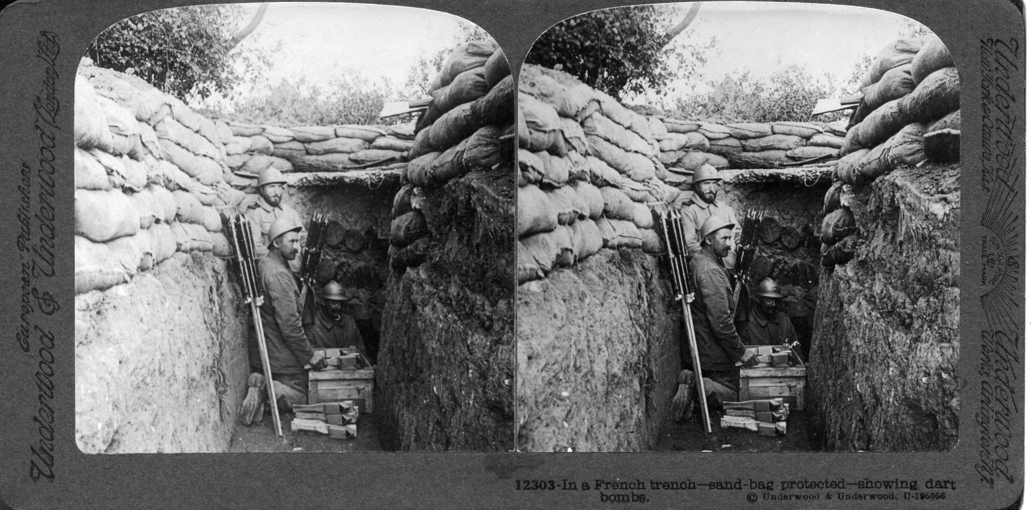 In a French trench--sand-bag protected--showing dart bombs