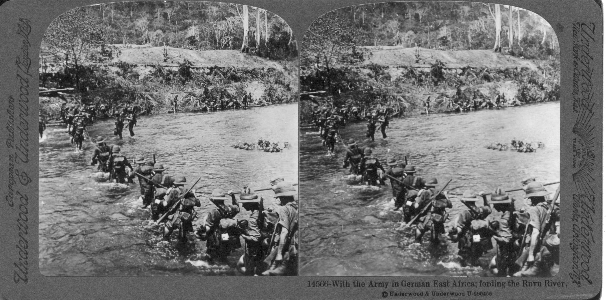 With the Army in German East Africa; fording the Ruva River