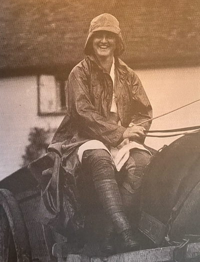 An official home front photograph of 1918 showing a woman carter doing that had previously been regarded as a man’s job. British official, Horace Nicholls, Q 31003.