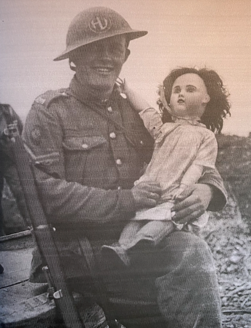 A publicity photograph of ‘Tommy Atkins’ taken and published to show the ‘Spirit of Play Still Dancing the Wake of War’ in The Illustrated, 25 May 1918, during the German offensive. British official, John Warwick Brooke, Q 6536