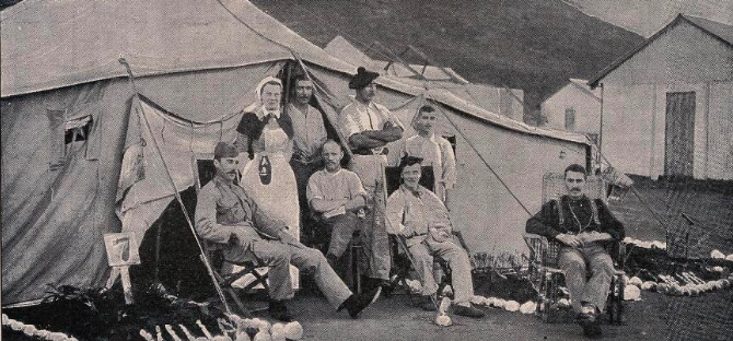 Boer War: soldiers from the Imperial Yeomanry and a nurse outside a military hospital tent. J Hall-Edwards Archive 1900.  (Public Domain)