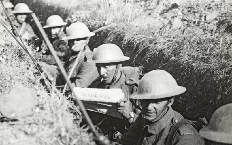 A British soldier catches up with the latest war stories from 'Balkans News', the official organ of the British Salonika Force. It was published from November 1915, NAM. 1978-11-157-29-6 until May 1919.