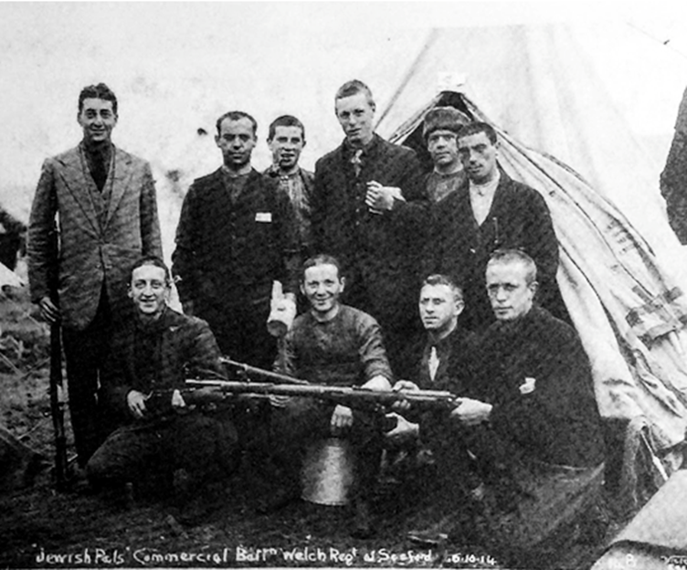 Jewish Pals ‘Commercial Battn’ Welch Regiment  Back row from left: Henry Barnett, Israel Shibko, Joe Zeitlin, Theo Fligelstone, Unkown, Monty Reed. Kneeling from left:  Henry Phillips, Henry Redhouse, Arthur Jacobs, Bert Fligelstone.