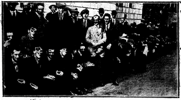 Typical Lewes Scene showing Cardiff Pals 'mostly of the commercial class' outside the County Hall (The Western Mail, 1914)