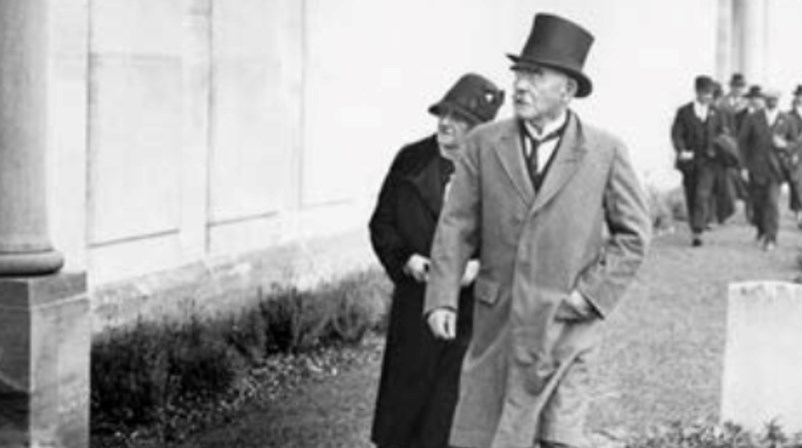 Rudyard Kipling, with his wife, Carrie, attends the ceremony in August 1930 at Dudd Corner Cemetery, where the name of their son, John, was commemorated on the wall of the Loos Memorial to the missing.