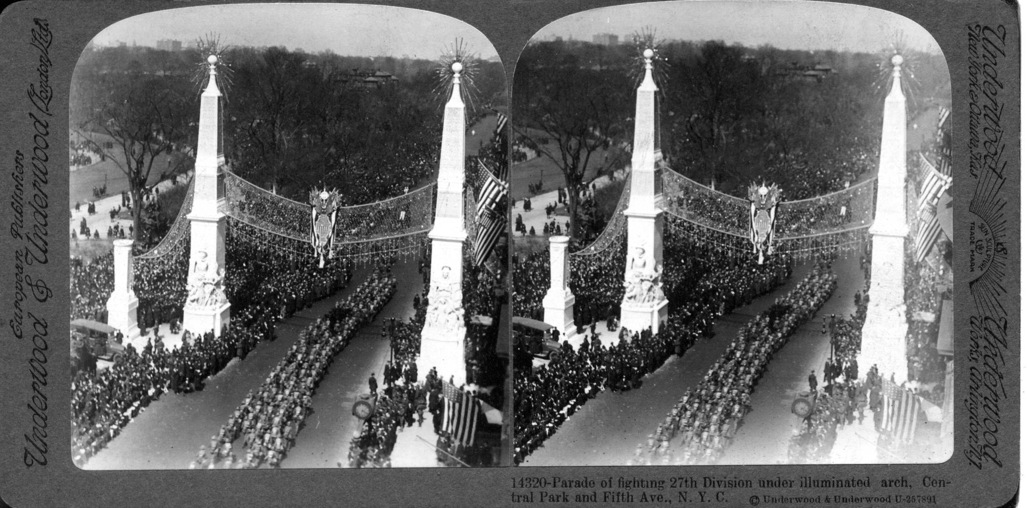 Parade of fighting 27th Division under illuminated arch, Central Park and Fifth Ave., N.Y.C.