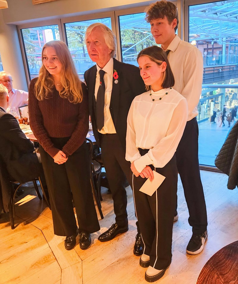 The Chair of The Western Front Association Tony Bolton with prize winner Lizzie Kenyon-Muir and runners up Rose Hall and Arthur Beresford-Jones .