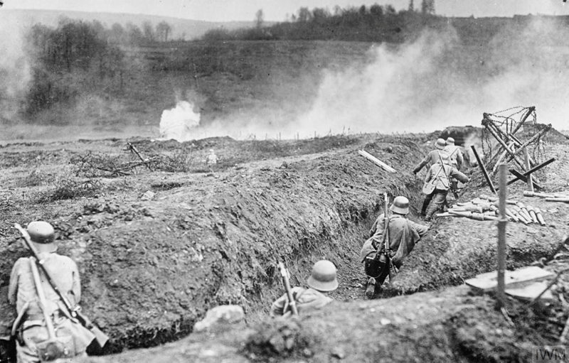 Stormtroopers practising the attack from a trench supported by flamethrowers. Near Sedan, May 1917. IWM Q45341