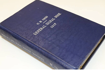 Great War Royal Naval signals book located in an Oxfam shop