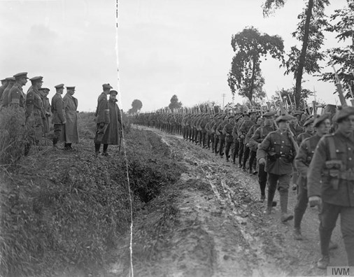 Troops Of The 6Th (Service) Battalion, King's Own Scottish Borderers Marching Past King George V Near La Brearde, 6 August 1918. IWM Q 9202
